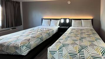 Deluxe Room, 2 Double Beds, Non Smoking, Refrigerator & Microwave | Free WiFi, bed sheets