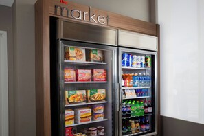 A vending machine with a variety of food and drink options, including boxed meals and bottled beverages. - Residence Inn By Marriott San Antonio Airport/Alamo Heights (San Antonio)