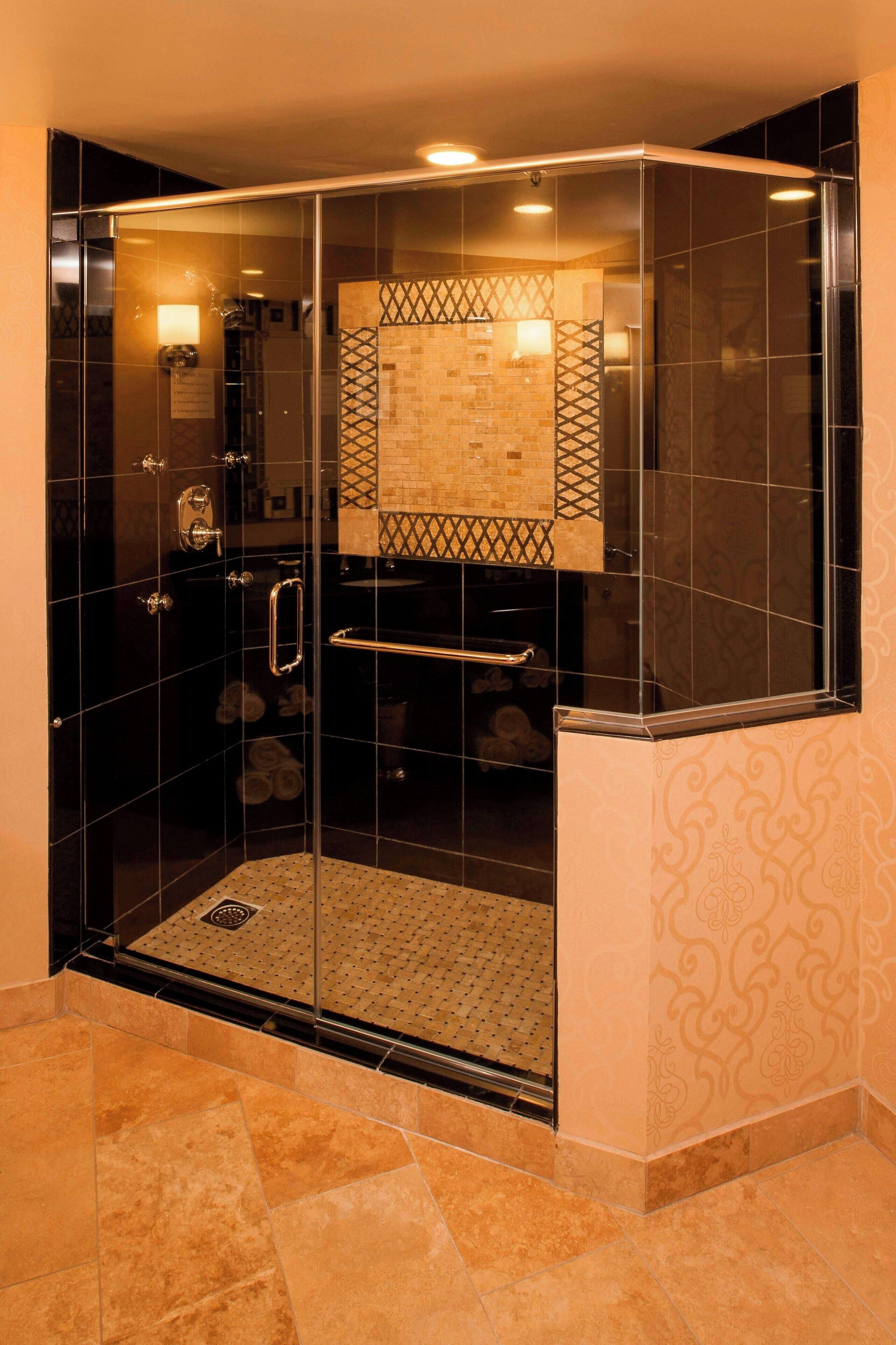 combined shower/bathtub, eco-friendly toiletries, hair dryer, bathrobes