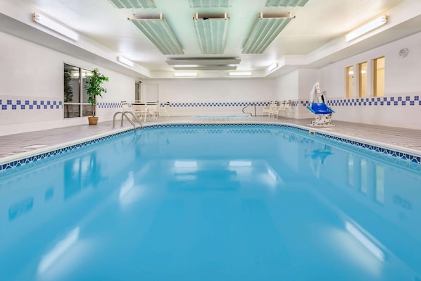 Indoor pool, open 6 AM to 11 PM, pool loungers