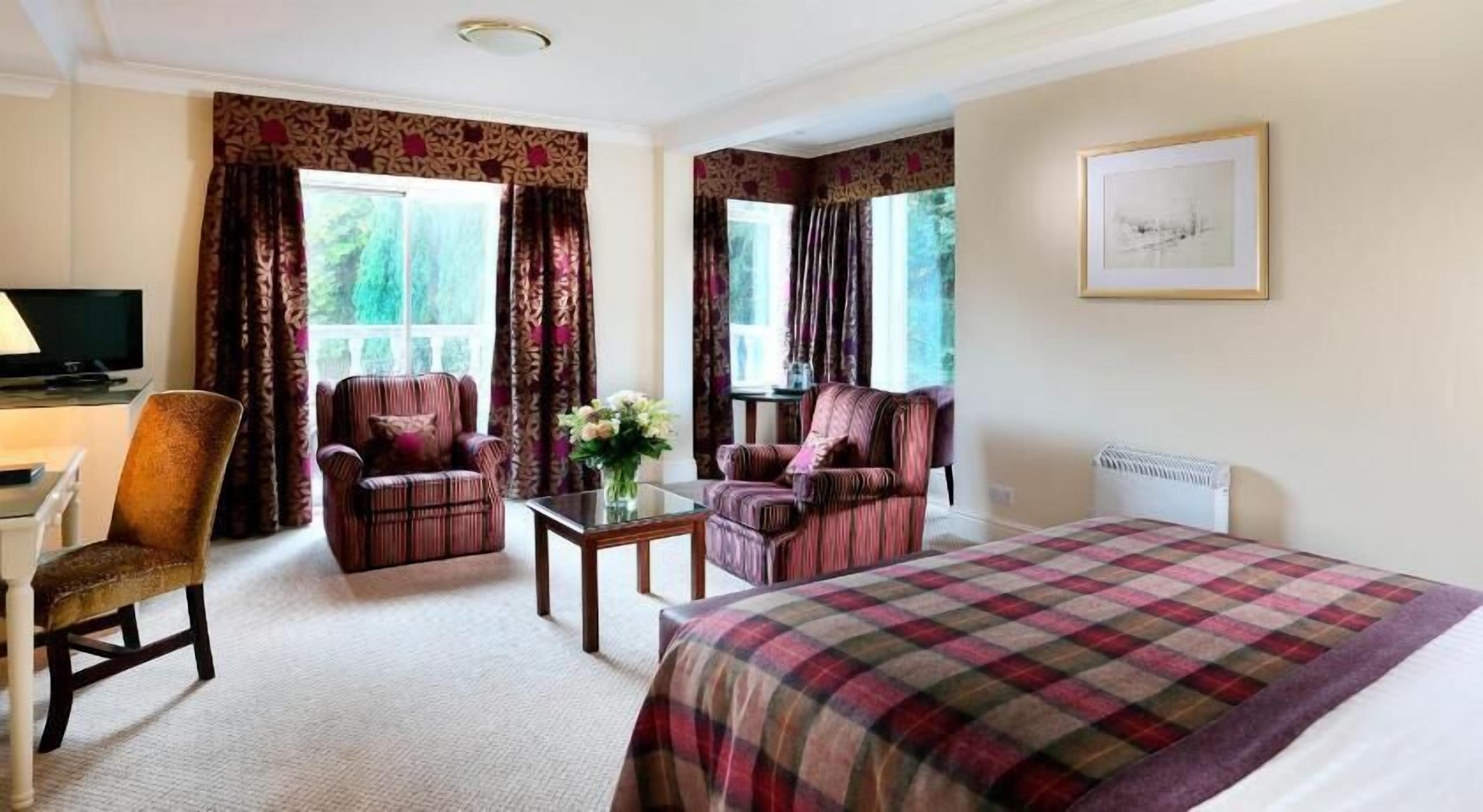 In-room safe, desk, blackout curtains, iron/ironing board