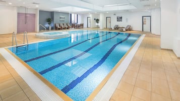 Indoor pool, open 7:30 AM to 8:00 PM, pool loungers