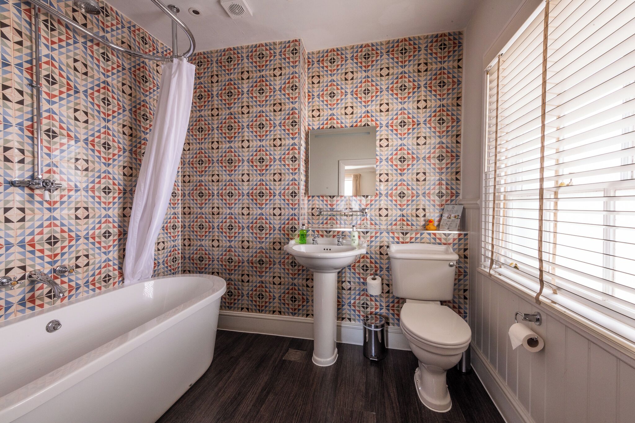 superior double room | bathroom | combined shower/bathtub, eco-friendly toiletries, hair dryer, towels