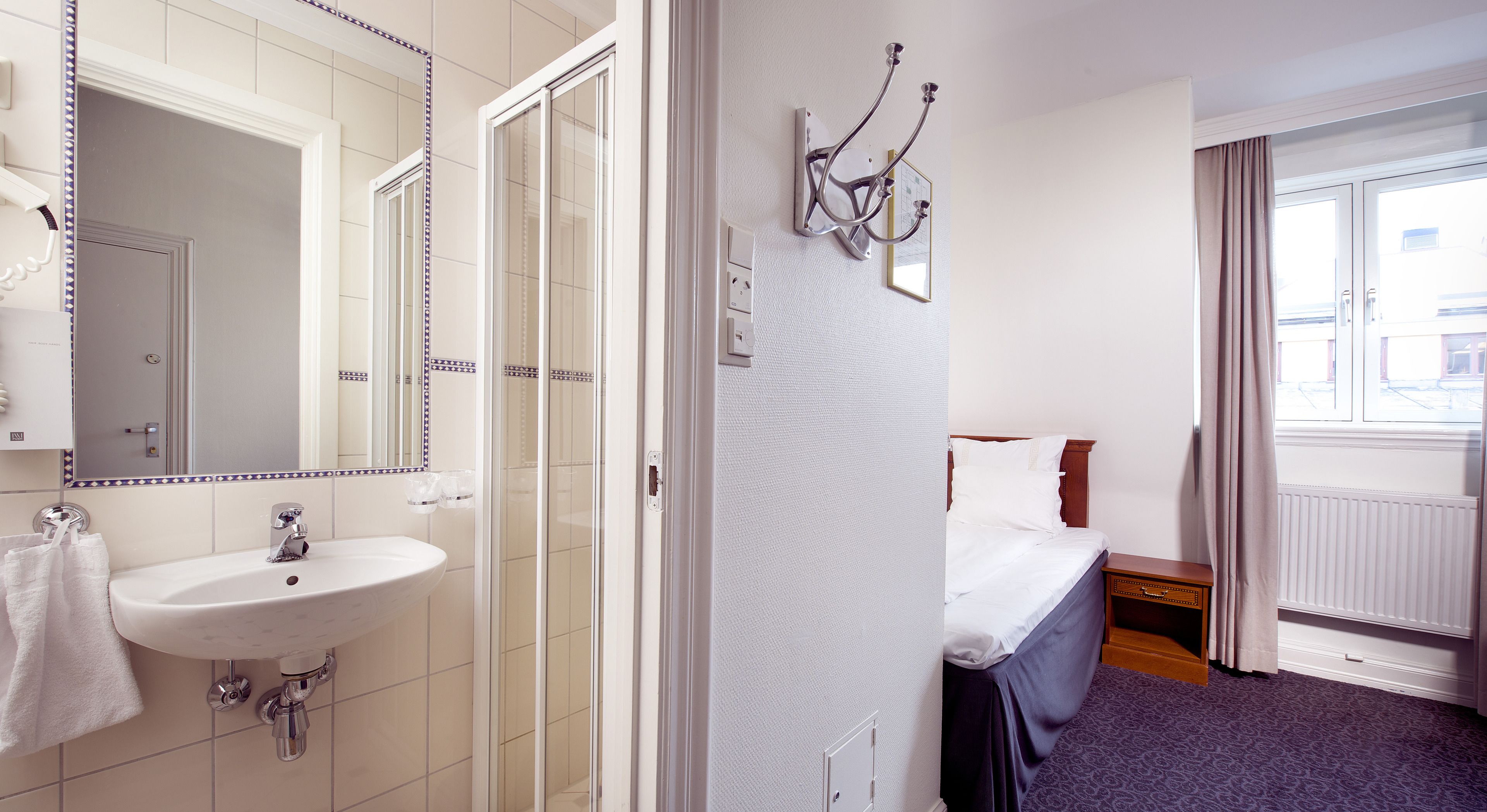 standard room, 1 double bed | bathroom | eco-friendly toiletries, hair dryer, towels