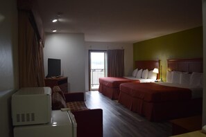 Desk, blackout drapes, iron/ironing board, rollaway beds