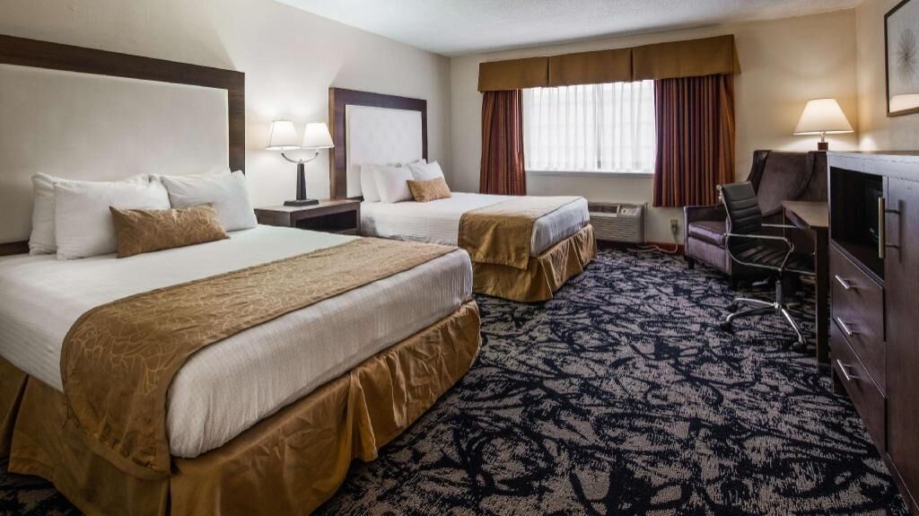 Pillow-top beds, desk, laptop workspace, blackout curtains