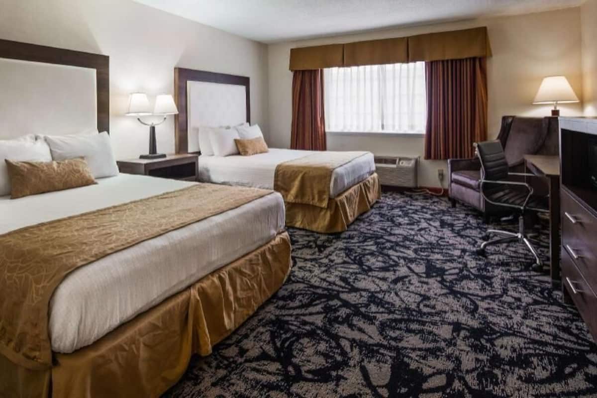 Pillow-top beds, desk, laptop workspace, blackout curtains