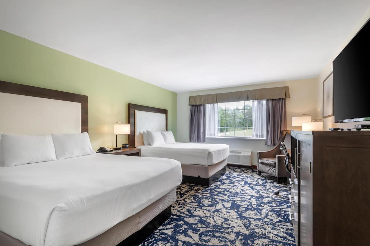 Pillow-top beds, desk, laptop workspace, blackout curtains
