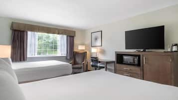 Senger med overmadrass, skrivebord og skrivebord for bærbar PC