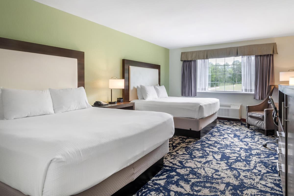 Pillowtop beds, desk, laptop workspace, blackout drapes