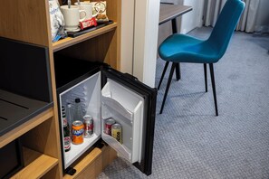 Desk, laptop workspace, blackout curtains, iron/ironing board