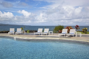 Outdoor pool, open 8:00 AM to 10:00 PM, cabanas (surcharge)