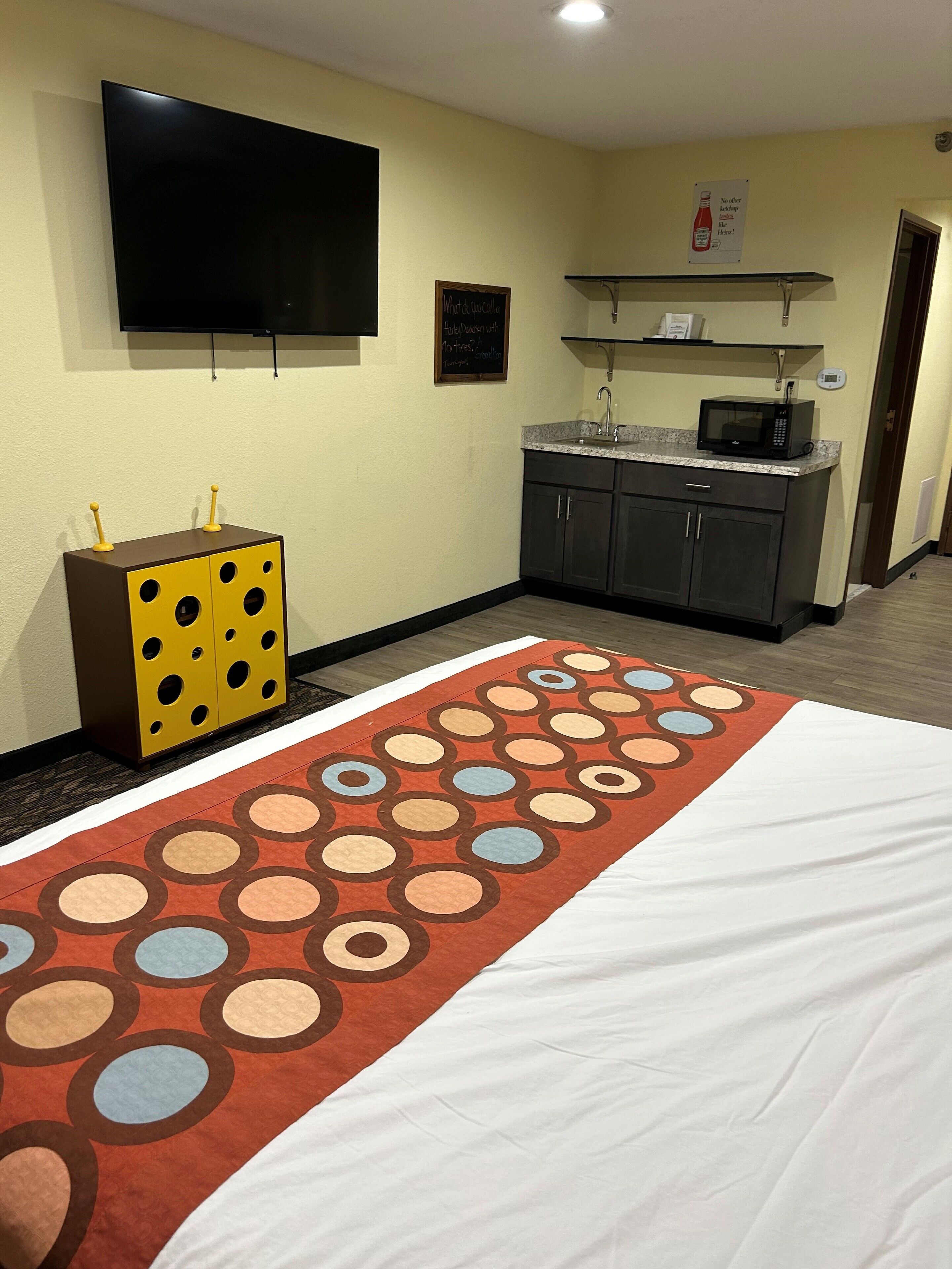 family suite, 1 king bed, 1 bunk bed, non smoking | in-room safe, laptop workspace, iron/ironing board