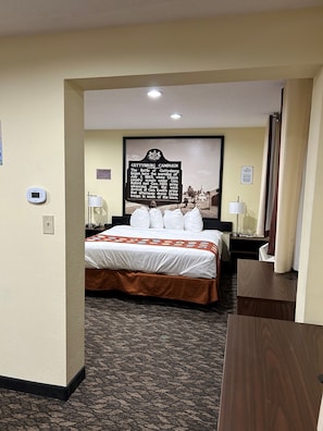 Family Suite, 1 King Bed, 1 Bunk Bed, Non Smoking | In-room safe, laptop workspace, iron/ironing board