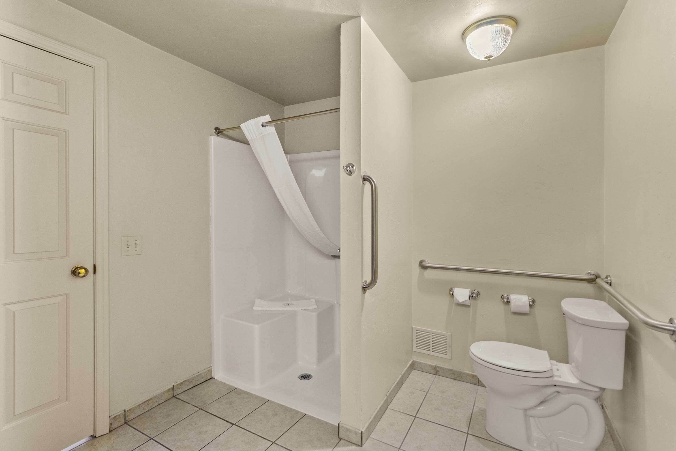 in-room safe, desk, blackout curtains, iron/ironing board