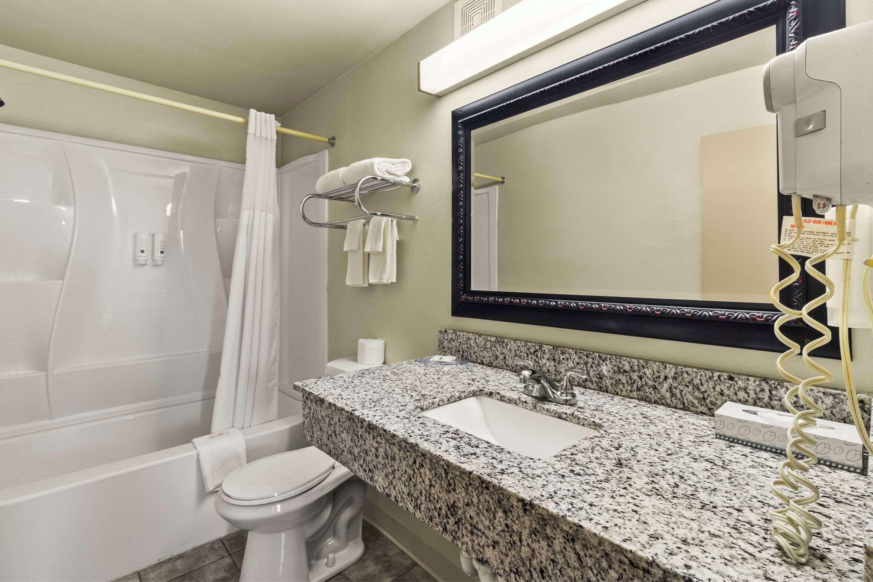 in-room safe, desk, blackout curtains, iron/ironing board