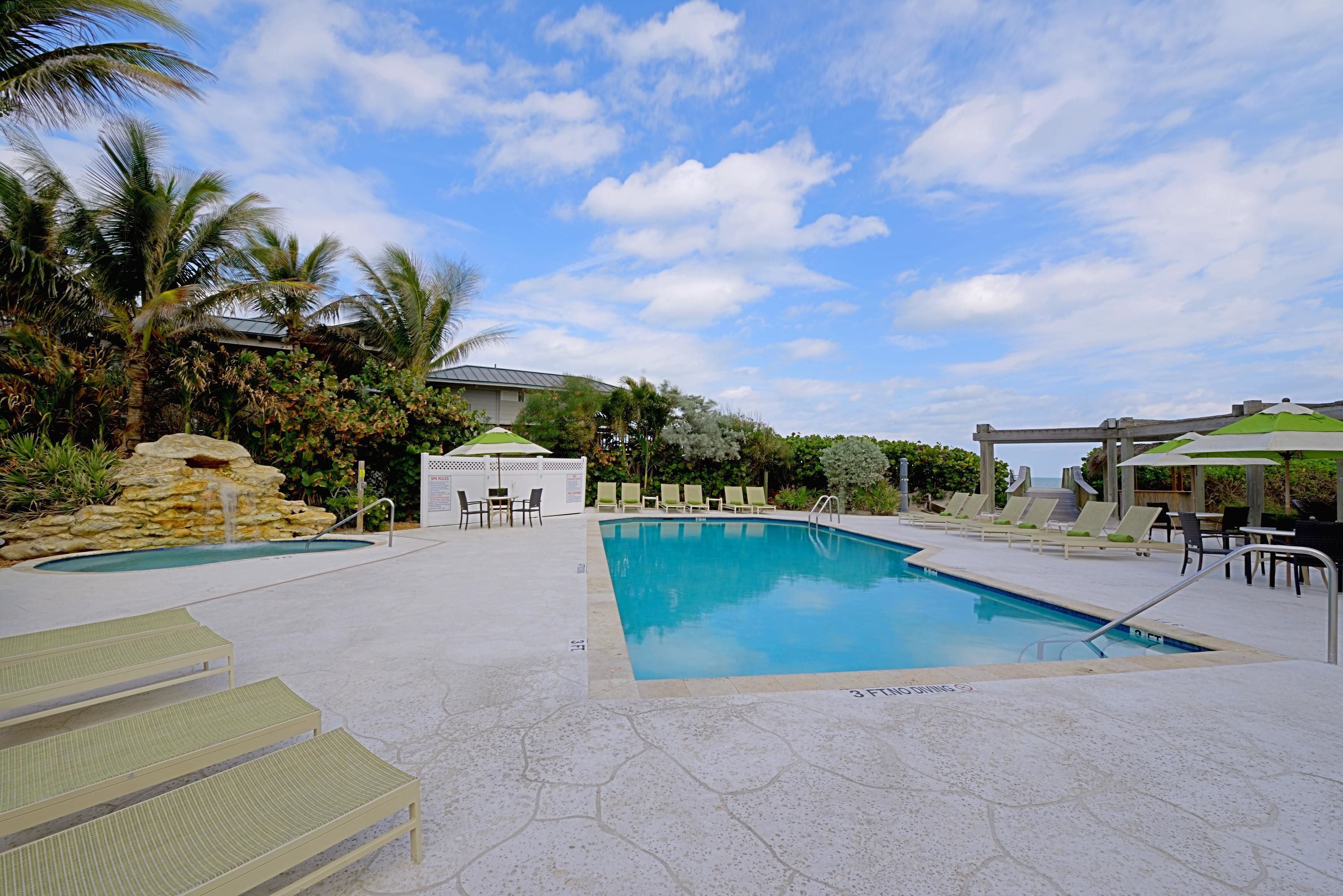 outdoor pool, open 7:00 am to 8:00 pm, pool umbrellas, pool loungers