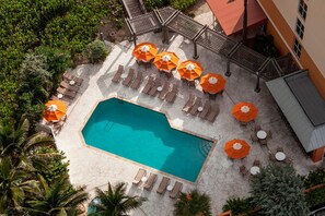 Outdoor pool, open 7:00 AM to 8:00 PM, pool umbrellas, pool loungers