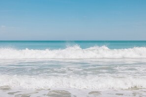 A beach with waves crashing onto the shore. - The Lucie (Jensen Beach)