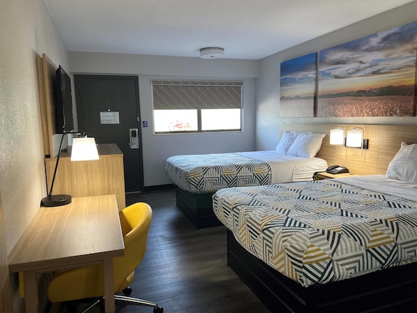 Premium bedding, down duvets, memory-foam beds, desk