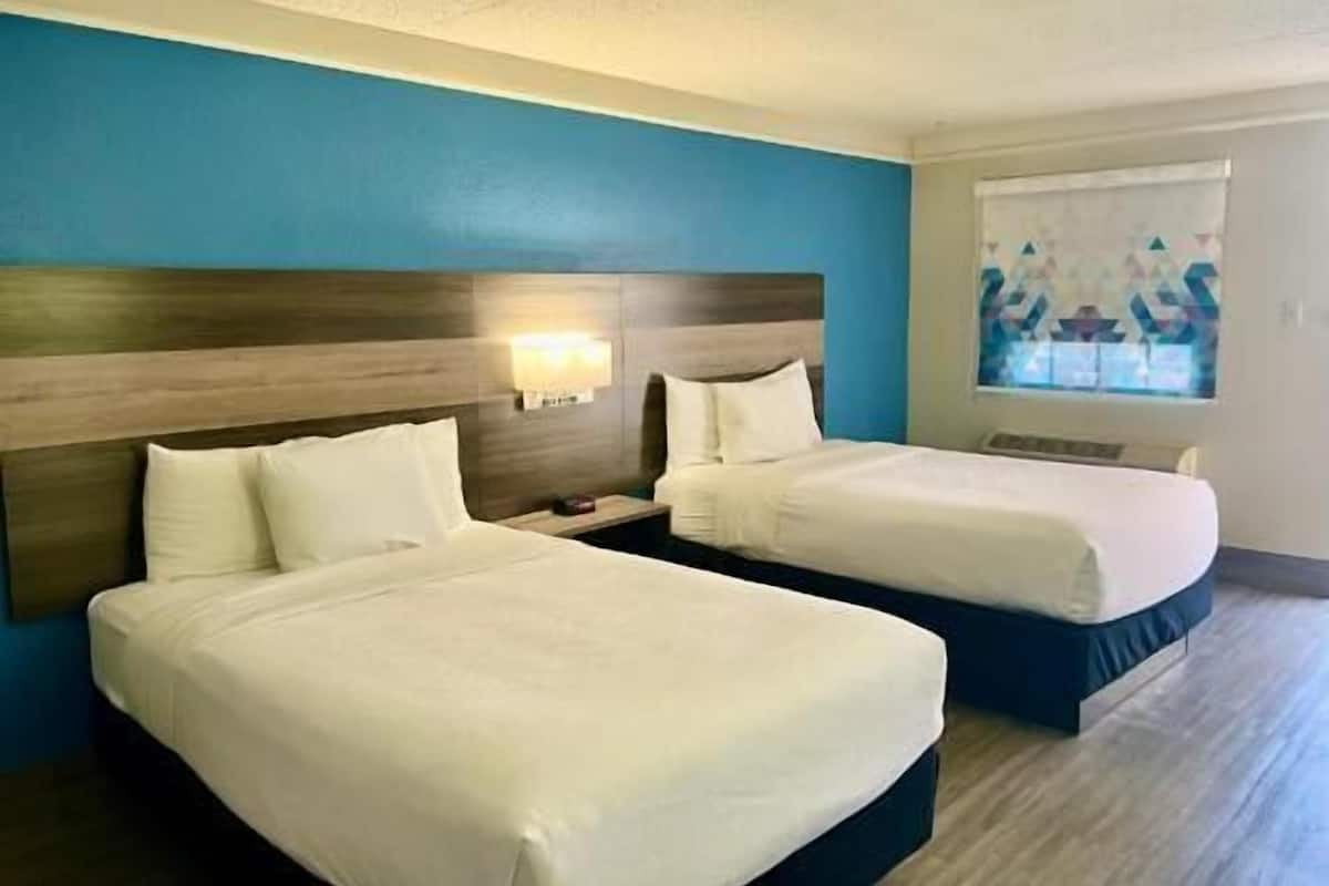 Premium bedding, desk, iron/ironing board, free cribs/infant beds
