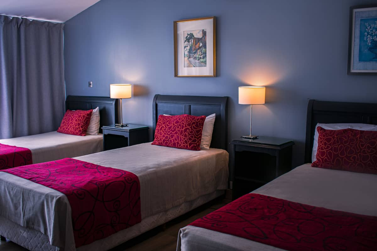 Standard Triple Room | Down duvets, in-room safe, individually decorated, desk