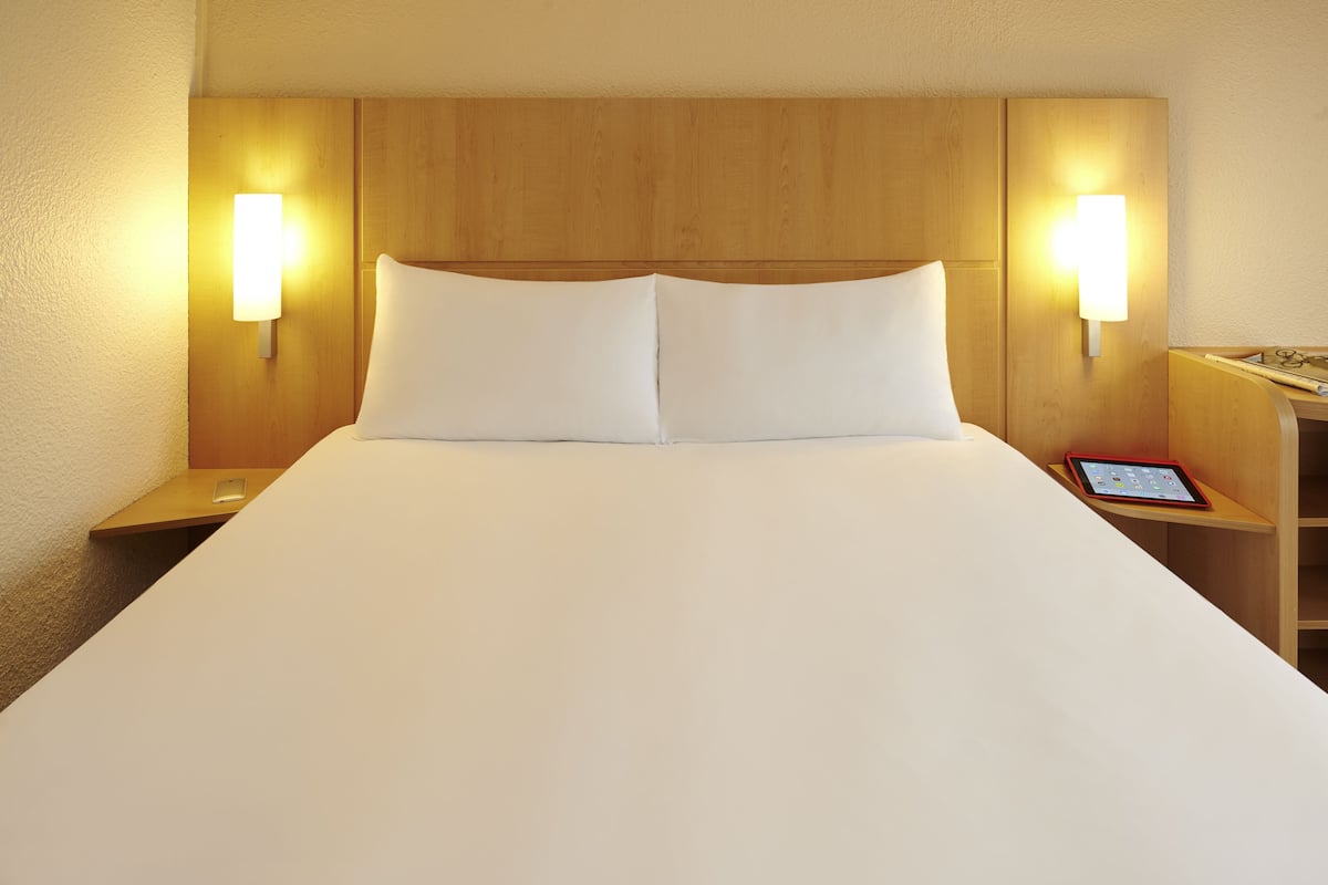 Premium bedding, desk, blackout curtains, soundproofing