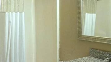 Combined shower/tub, eco-friendly toiletries, hair dryer, towels