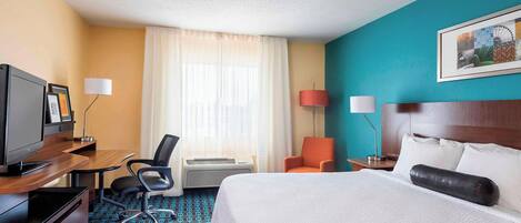 Pillowtop beds, desk, blackout drapes, iron/ironing board