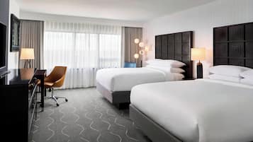 Luxe beddengoed, pillowtop-bedden, een kluis op de kamer, een bureau