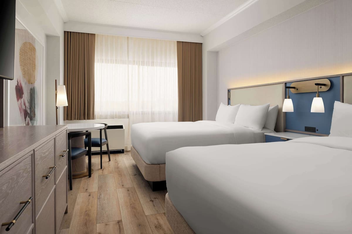 Premium bedding, pillow-top beds, in-room safe, desk