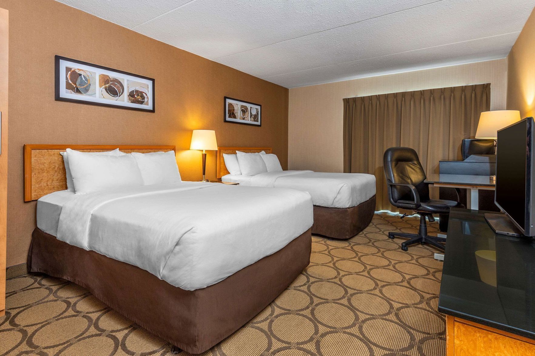 Premium bedding, pillowtop beds, desk, iron/ironing board