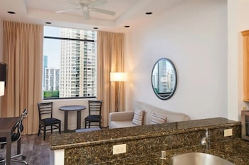 Luxury Suite, 1 King Bed, Kitchen | Pillowtop beds, in-room safe, blackout drapes, iron/ironing board at Aqua Palms Waikiki