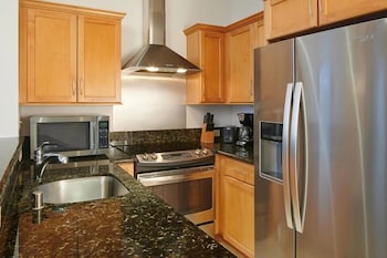 Luxury Suite, 1 King Bed, Kitchen | Private kitchen | Mini-fridge, microwave, coffee/tea maker, cookware/dishes/utensils at Aqua Palms Waikiki