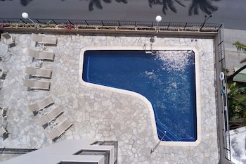 Outdoor pool, open 8:00 AM to 10:00 PM, sun loungers at Aqua Palms Waikiki
