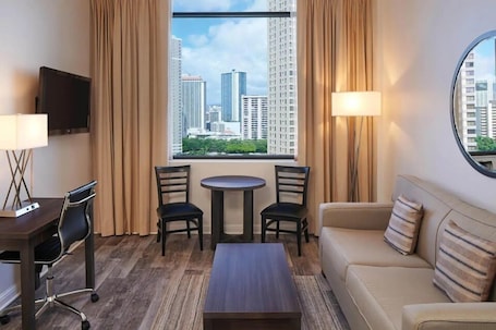 Luxury Suite, 1 King Bed, Kitchen | Pillowtop beds, in-room safe, blackout drapes, iron/ironing board