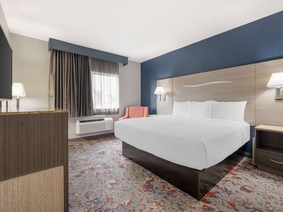 Luxe beddengoed, een bureau, verduisterende gordijnen, gratis wifi