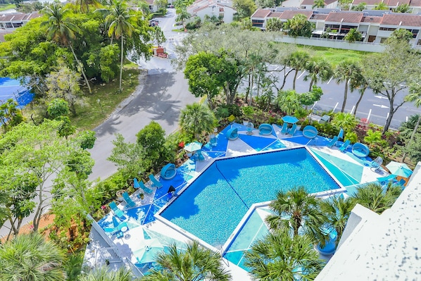 Outdoor pool, pool umbrellas, sun loungers