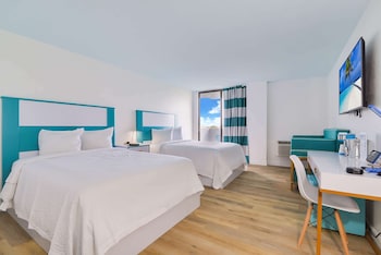 Premium bedding, memory foam beds, in-room safe, desk at Chateau Mar Golf Resort, Trademark Collection by Wyndham
