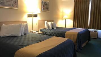 Meja kerja, tempat tidur lipat/tambahan, Wi-Fi gratis, dan seprai linen