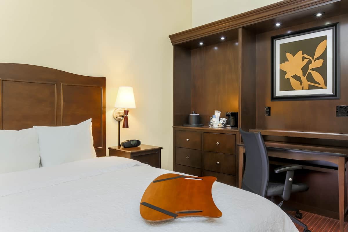 premium bedding, pillow-top beds, desk, blackout curtains