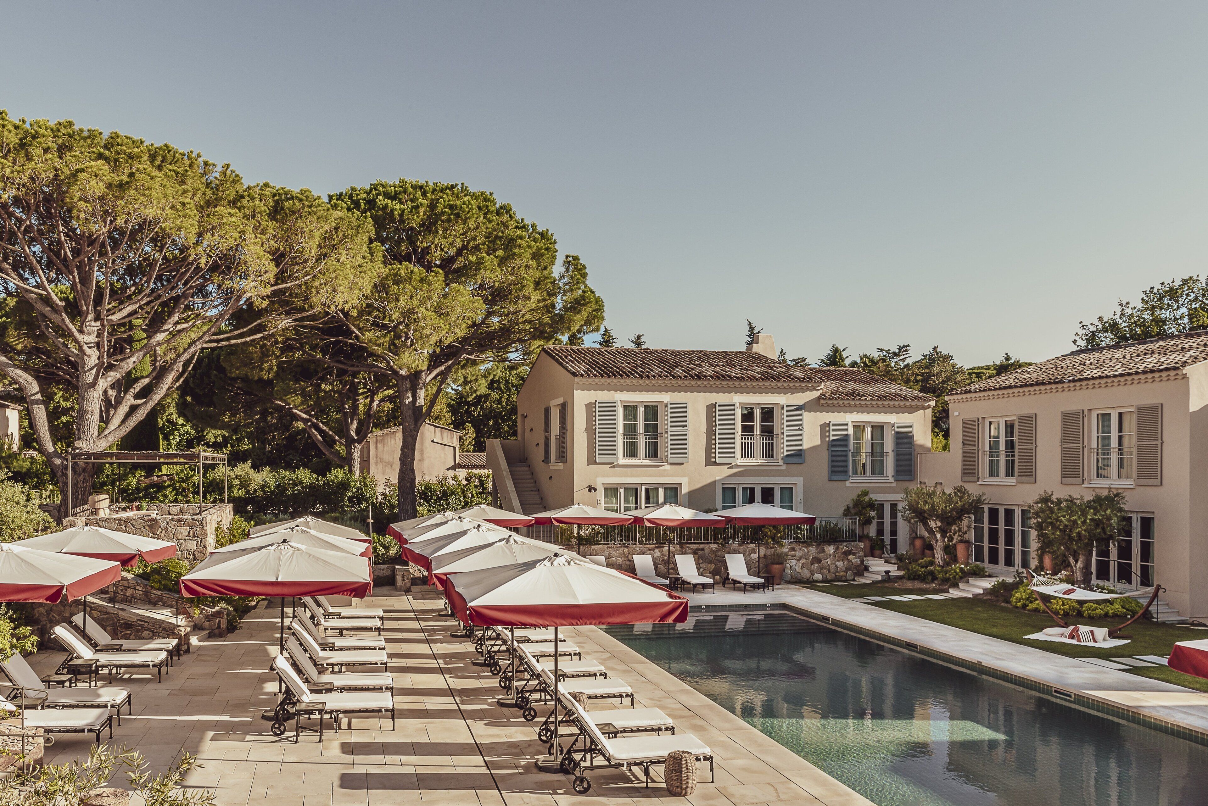 Outdoor pool, open 8:00 AM to 8:00 PM, pool umbrellas, pool loungers