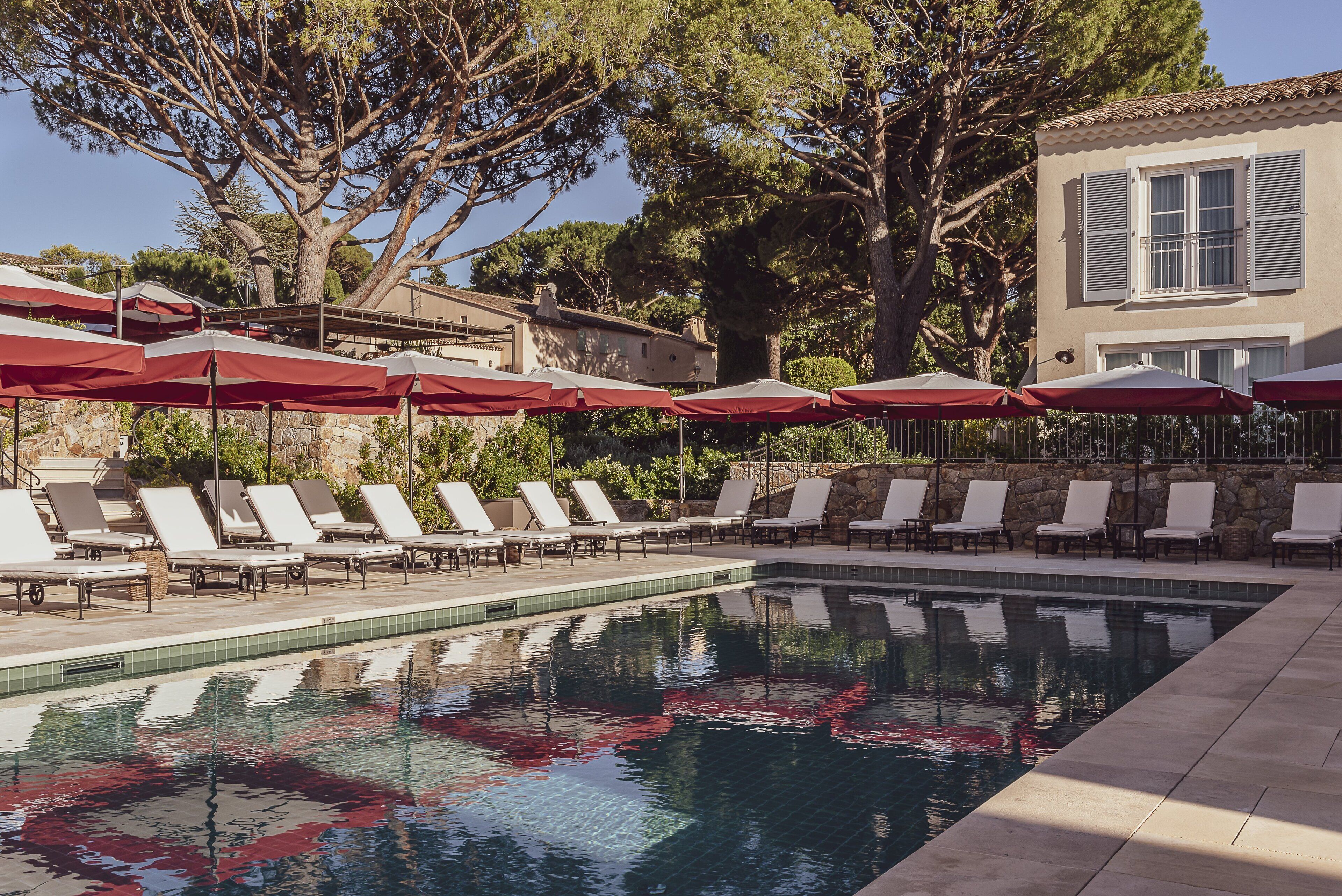 outdoor pool, open 8:00 am to 8:00 pm, pool umbrellas, pool loungers