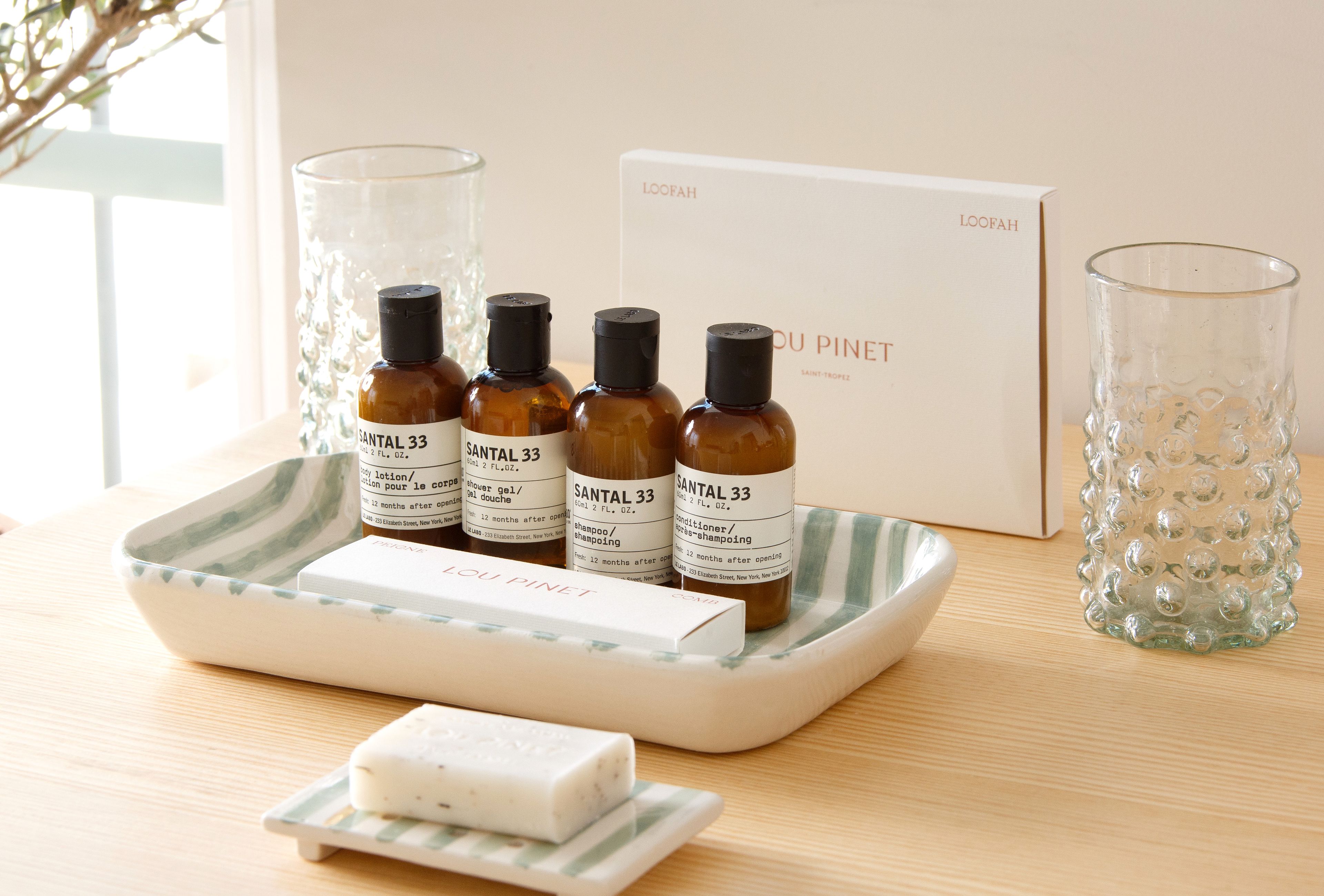 eco-friendly toiletries, hair dryer, bathrobes, slippers