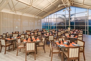 Breakfast, lunch, dinner served; pool views