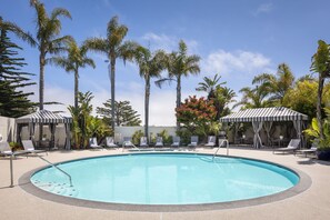 Outdoor pool, open 7:00 AM to 10:00 PM, sun loungers