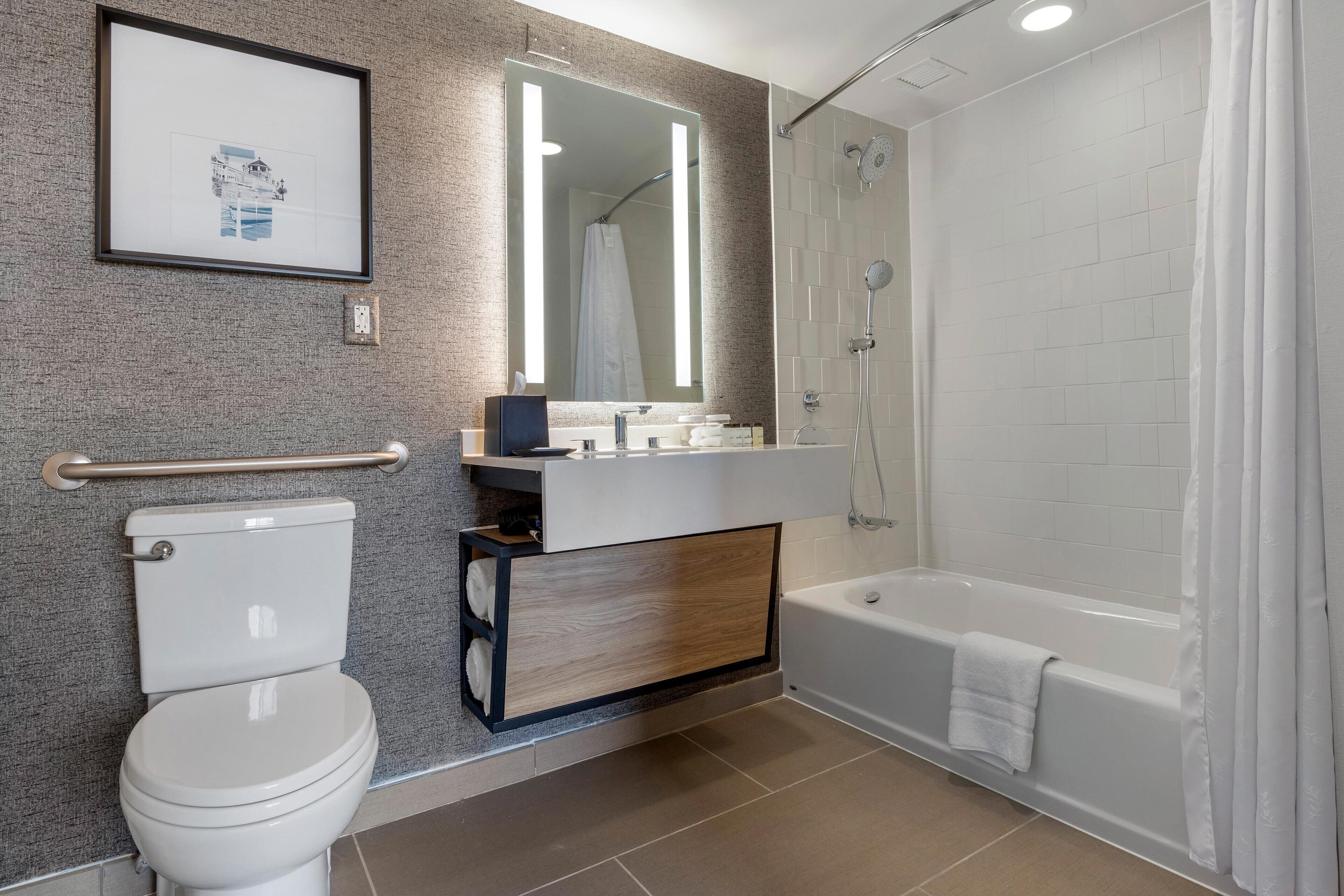 combined shower/bathtub, eco-friendly toiletries, hair dryer, towels