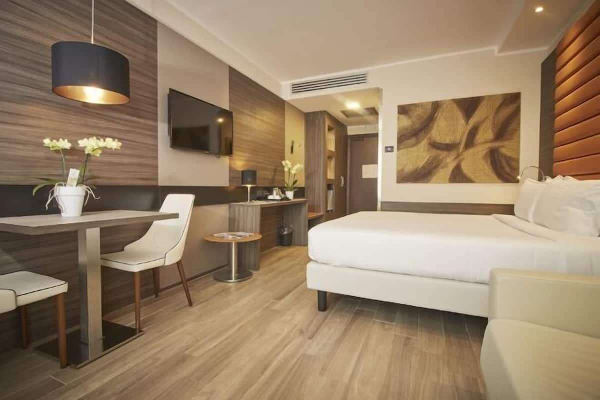 Premium bedding, down duvets, minibar, in-room safe