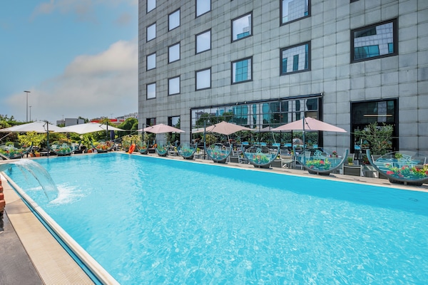 Seasonal outdoor pool, open 8:00 AM to 8:00 PM, sun loungers