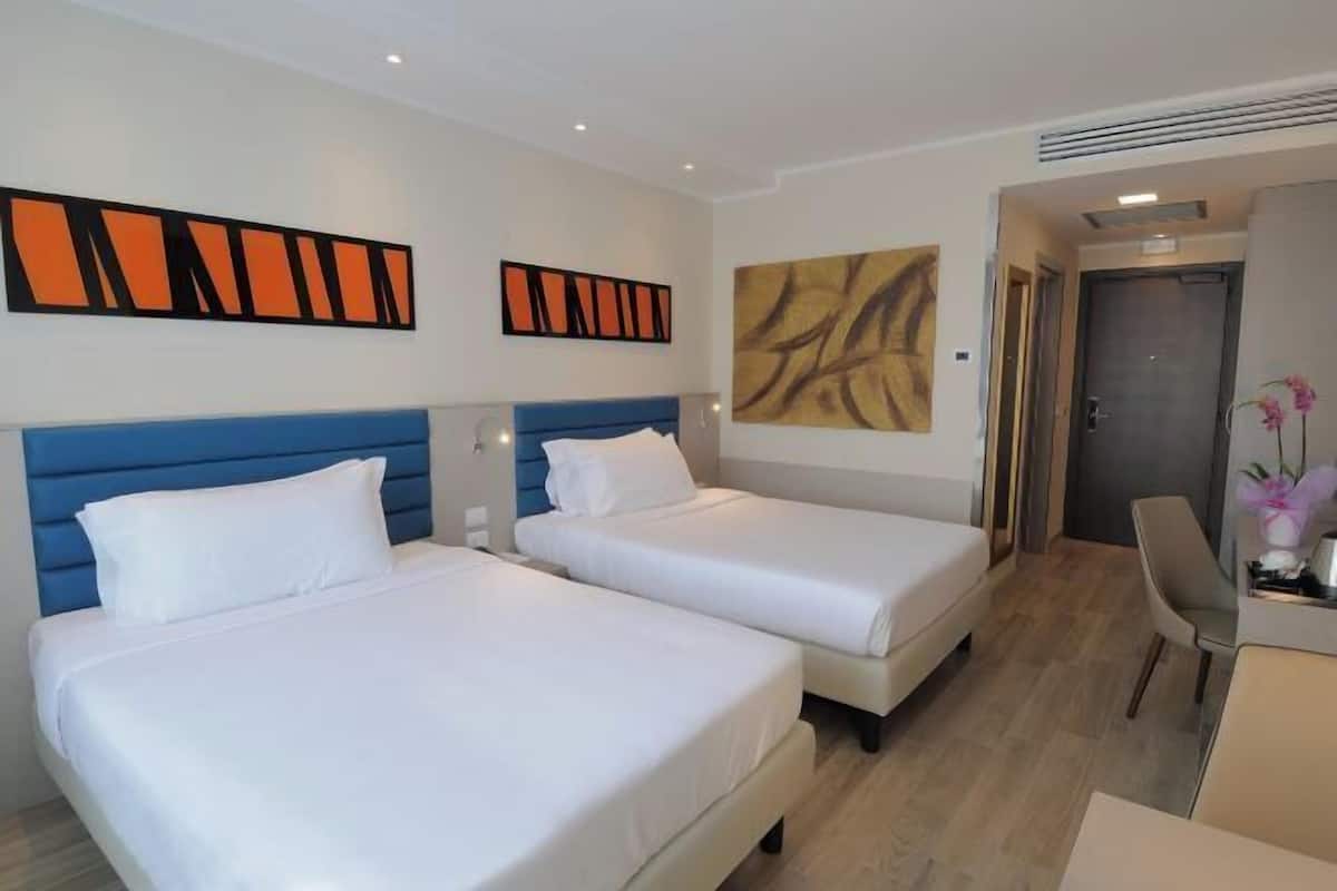 Premium bedding, down duvets, minibar, in-room safe